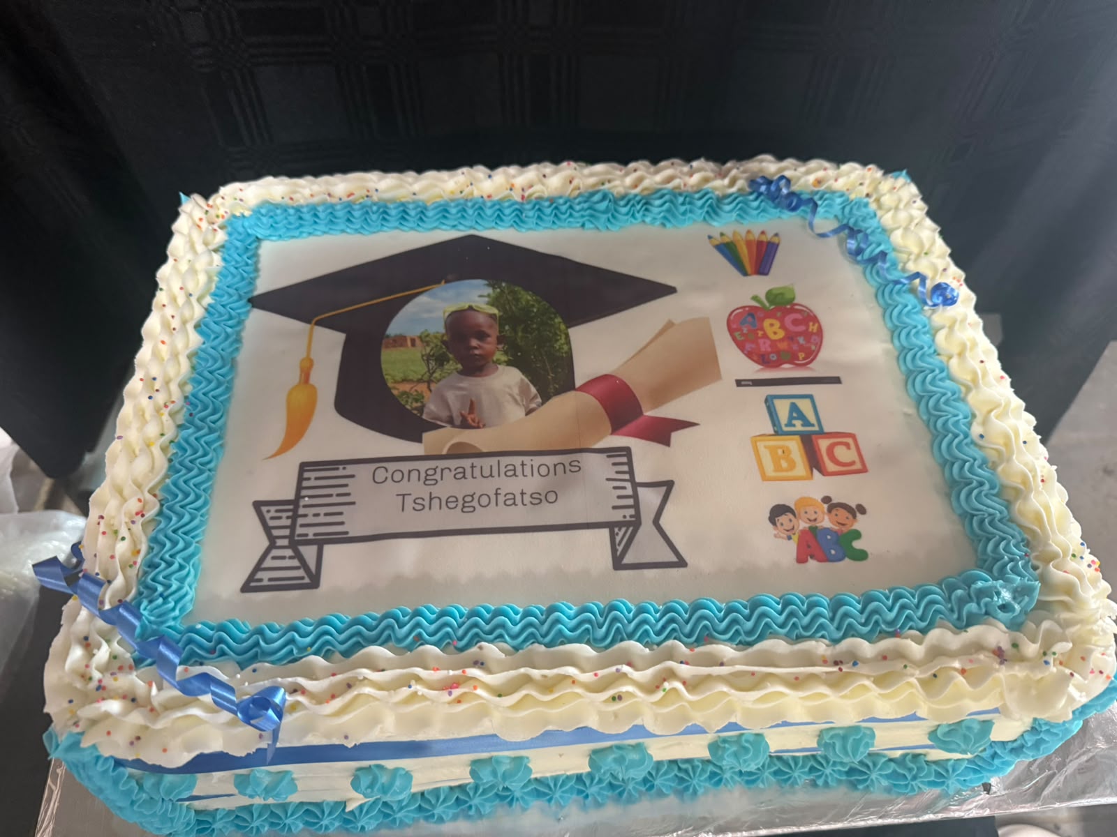 Blue graduation celebration cake
