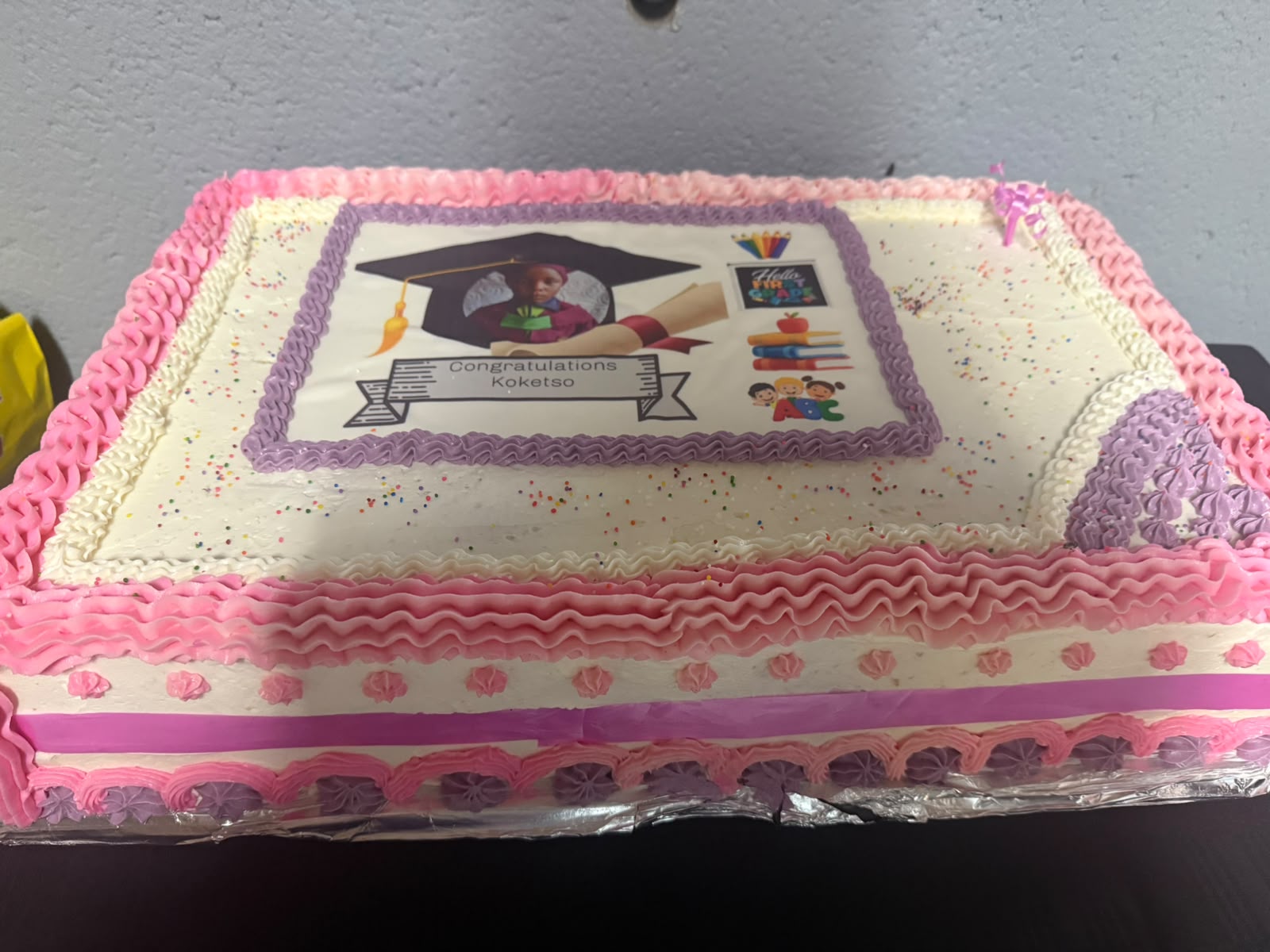 Pink graduation celebration cake